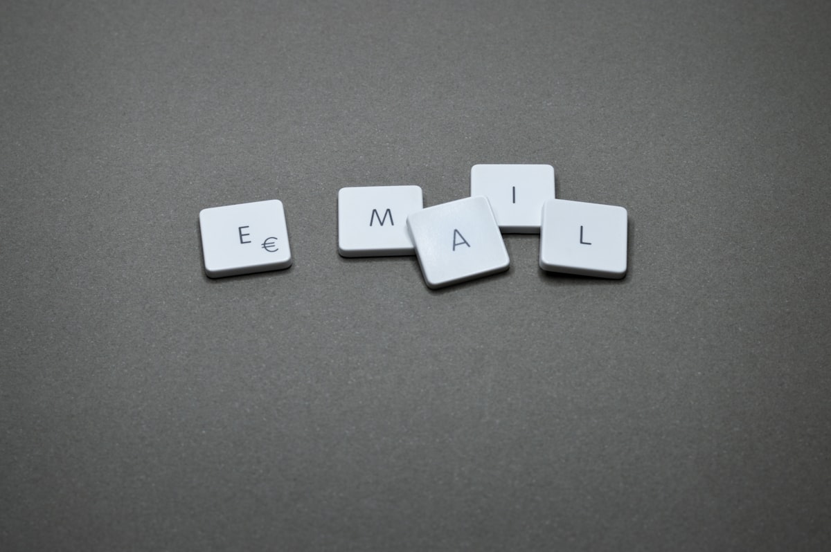 The word EMAIL spelled out with letter tiles