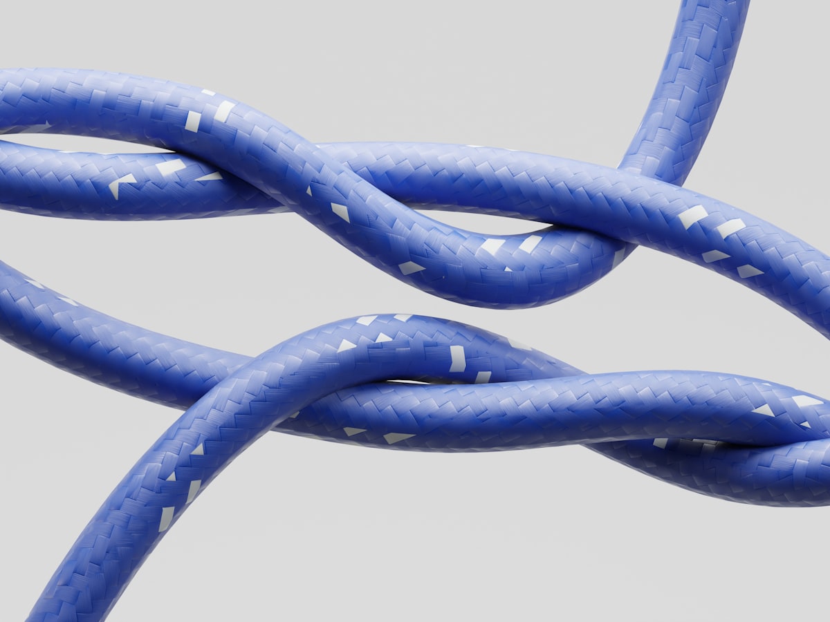 Tangled wires on a gray background