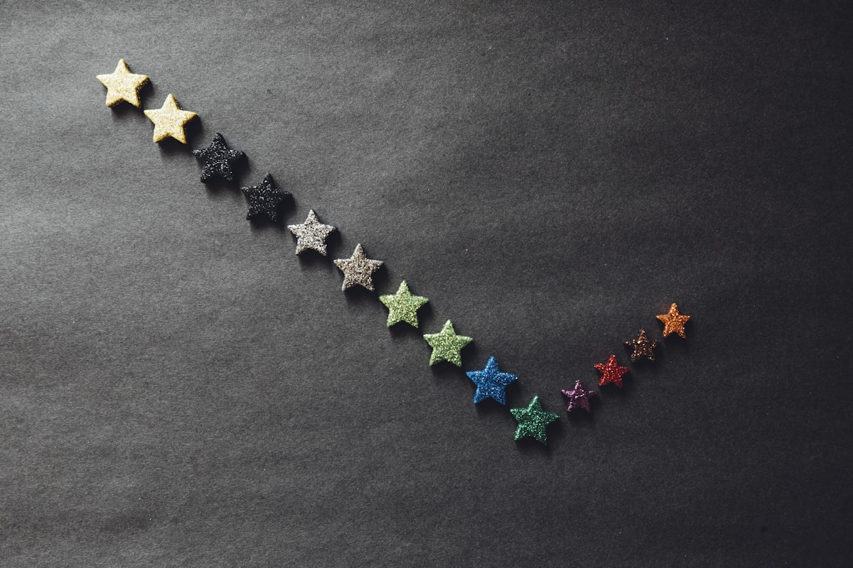 Row of stars on a black surface